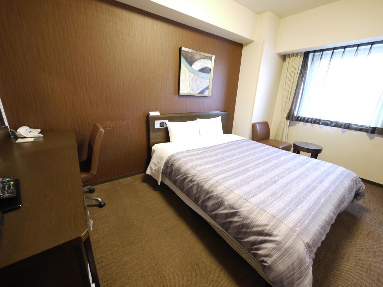 Hotel Route-Inn Chitose Ekimae Exteriör bild